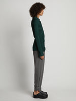 Side full length image of model wearing Flannel Tapered Pants in GREY MELANGE