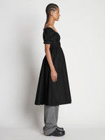 Side full length image of model wearing Square Neck Poplin Dress in BLACK