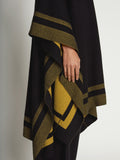 Back full length image of model wearing Cashmere Blend Poncho in BLACK/DARK SAND