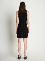 Back full length image of model wearing Sleeveless Cashfeel Mini Dress in BLACK