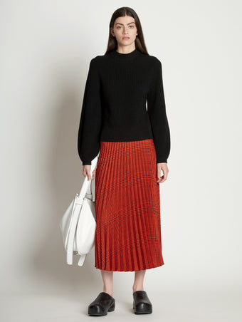 Front full length image of model wearing Pleatable Crepe Midi Skirt
 in VERMILLION/BLACK