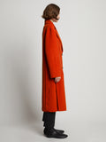 Side full length image of model wearing Melton Double Face Coat in VERMILLION MELANGE