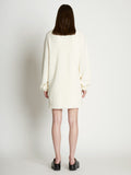 Back full length image of model wearing Cashfeel Cardigan in CREAM