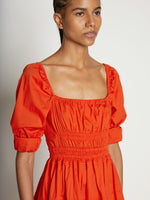 Detail image of model wearing Square Neck Poplin Dress in CHERRY