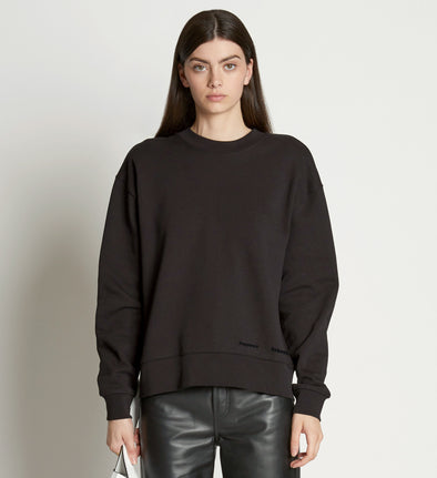 Front cropped image of model wearing Long Sleeve Sweatshirt in BLACK