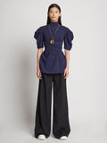 Front full length image of model wearing Matte Viscose Crepe Belted Top in NAVY