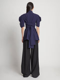 Back full length image of model wearing Matte Viscose Crepe Belted Top in NAVY