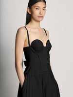 Detail image of model wearing Poplin Bustier Dress in BLACK