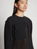 Detail image of model wearing Sheer Pleated Flou Top in BLACK