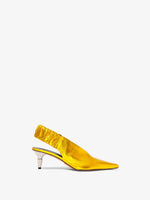 Front image of Spike Slingback Pumps in Gold