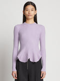 Front cropped image of model wearing Fluted Rib Knit Peplum Sweater in LAVENDER