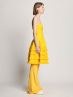 Side full length image of model wearing Textured Fringe Knit Sculpted Dress in LEMON