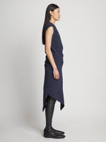 Side image of model wearing Matte Viscose Crepe Spiral Dress in navy