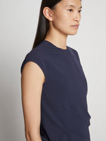 Detail image of model wearing Matte Viscose Crepe Spiral Dress in navy