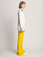 Side image of model wearing Bi-Stretch Crepe Pants in lemon