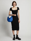 Image of model wearing Medium Baxter Leather Bag in COBALT