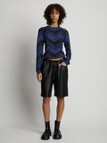 Front image of model wearing Marled Stripe Knit Sweater in cerulean/black