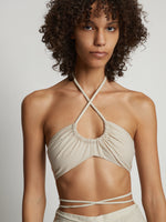 Detail image of model wearing Gingham Halter Bralette in buttercream/fawn