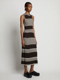 Side image of model wearing Mini Stripe Sleeveless Knit Dress in dark brown/off white