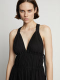 Detail image of model wearing Broomstick Pleated Tank Dress in black