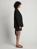 Side image of model wearing Cotton Linen Blazer in black