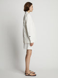 Side image of model wearing Cotton Linen Blazer in off white