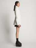 Side image of model in Boucle Tweed Jacket in Off White