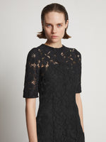 Detail image of model wearing Lace Dress in black