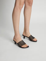 Image of model wearing SCULPT WOVEN SLIDES - 40MM in BLACK