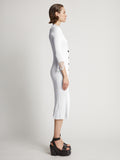 Side image of model wearing Viscose Knit Dress in optic white