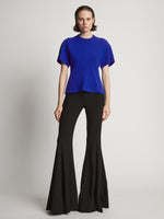 Front image of model wearing Eco Cotton Waisted T-Shirt in cobalt