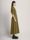 Side image of model wearing Matte Viscose Crepe Dress in fatigue