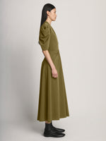 Side image of model wearing Matte Viscose Crepe Dress in fatigue