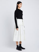 Side image of model wearing Poplin Belted Skirt in white