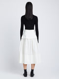 Back image of model wearing Poplin Belted Skirt in white