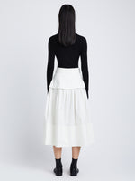 Back image of model wearing Poplin Belted Skirt in white