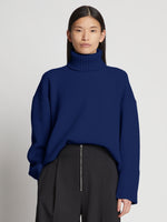 Cropped front image of model wearing Doubleface Cashmere Oversized Turtleneck in cobalt