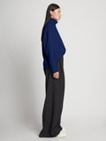 Side image of model wearing Doubleface Cashmere Oversized Turtleneck in cobalt