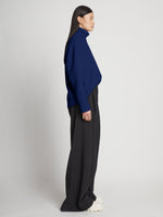 Side image of model wearing Doubleface Cashmere Oversized Turtleneck in cobalt