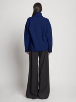 Back image of model wearing Doubleface Cashmere Oversized Turtleneck in cobalt