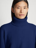 Detail image of model wearing Doubleface Cashmere Oversized Turtleneck in cobalt