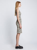 Side full length image of model wearing Animal Jacquard Tank Top Dress in BEIGE/BLACK