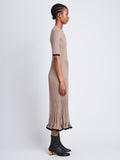 Side full length image of model wearing Silk Cashmere Rib Knit Dress in TAUPE