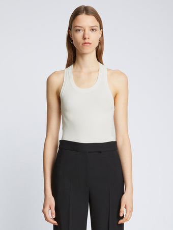 Front cropped image of model wearing Matte Viscose Rib Knit Tank in WHITE