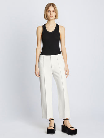 Front full length image of model wearing Bi-Stretch Crepe Cropped Pants in WHITE