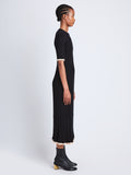 Side full length image of model wearing Silk Cashmere Rib Knit Dress in BLACK