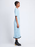 Side full length image of model wearing Silk Cashmere Rib Knit Dress in LIGHT BLUE