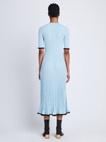 Back full length image of model wearing Silk Cashmere Rib Knit Dress in LIGHT BLUE