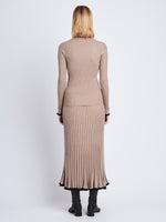 Back full length image of model wearing Silk Cashmere Rib Knit Sweater in TAUPE