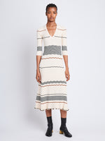 Front full length image of model wearing Wavy Stripe Rib Knit Dress in ECRU MULTI